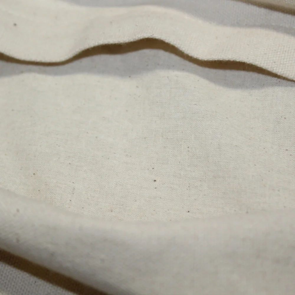 West Elm Tufted Jacquard Pillow Cover – Mustard & Gray Vintage-Inspired Pattern.